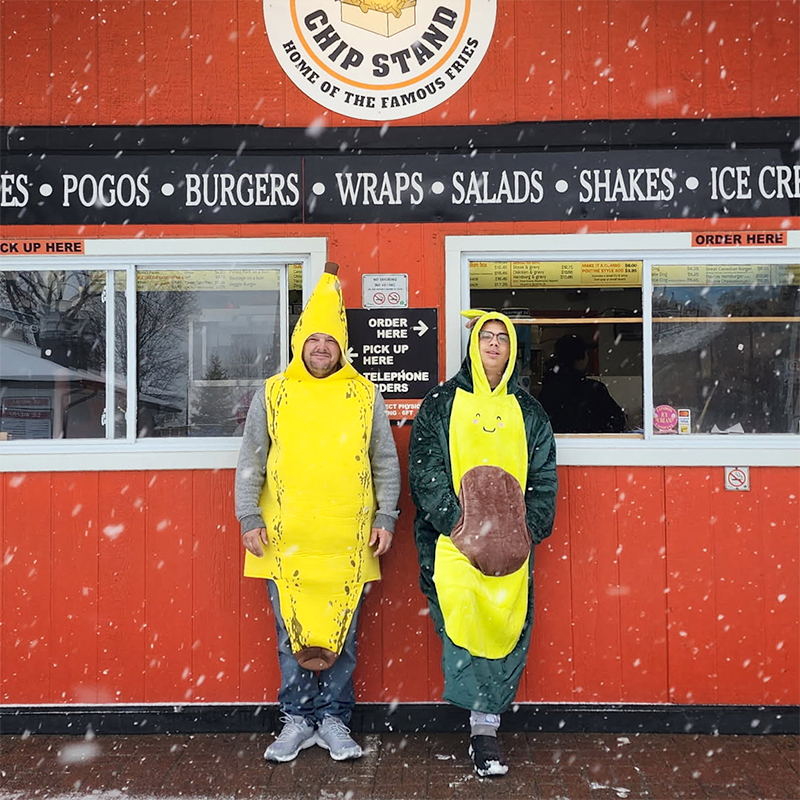 Farm-to-table-44 photo of people in front of chip stand wearing banana and avocado costumes